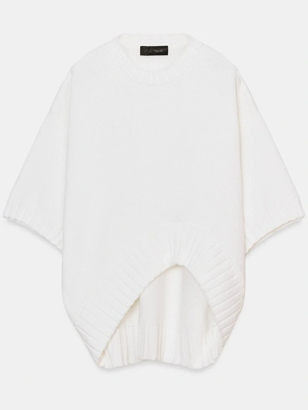 ZARA Loose-fit round neck short sleeve jumper with asymmetric hem.